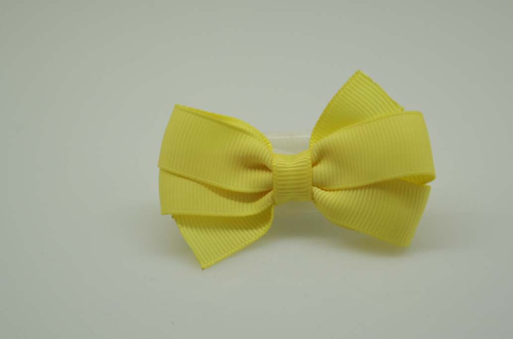 Small pinwheel hair Bow with colors  Baby Maize